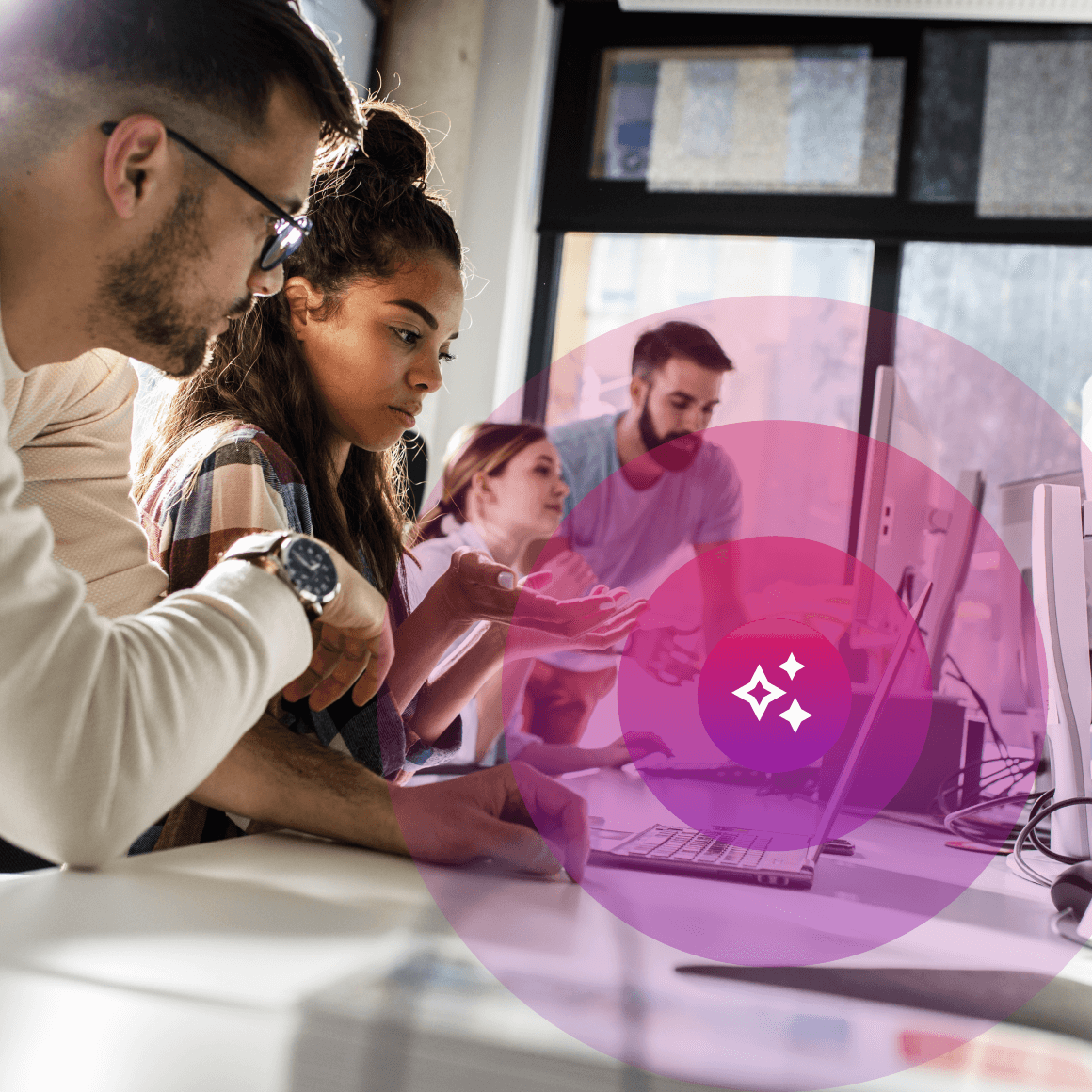 Team collaborating at a desk while using laptops, with an AI sparkle icon overlay representing LearnWorlds’ AI course creation.