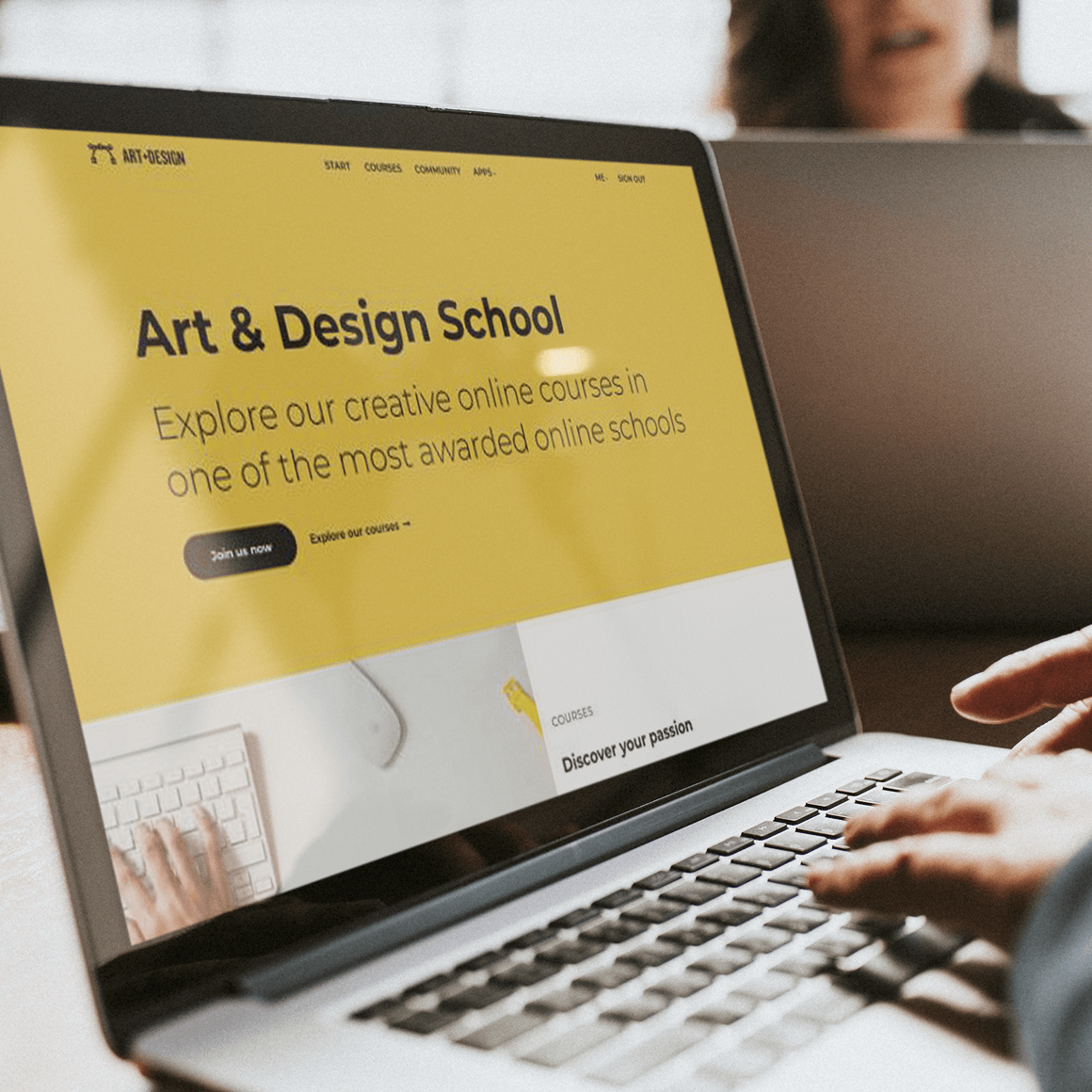 A laptop showing an ‘Art & Design School’ site.