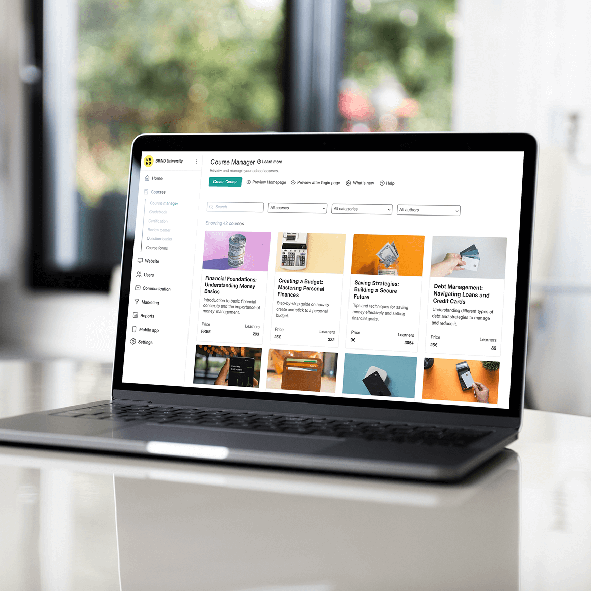 Membership website builder interface on laptop with course bundling features.