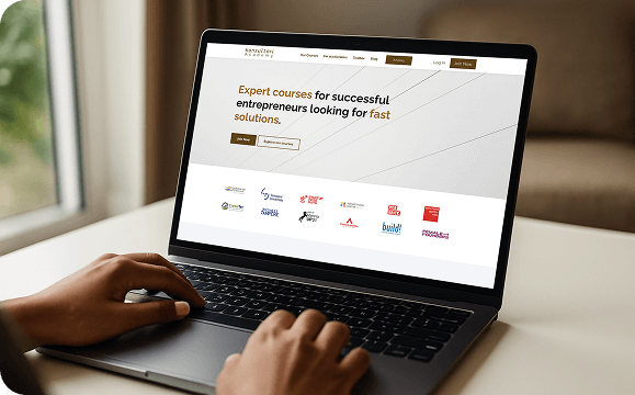 Person using a laptop next to a testimonial about Konsultori Academy growing with LearnWorlds analytics, with four metric tiles below.