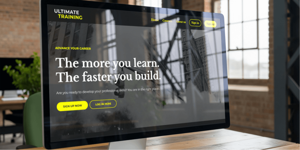 A website template preview on a computer screen on the desk.