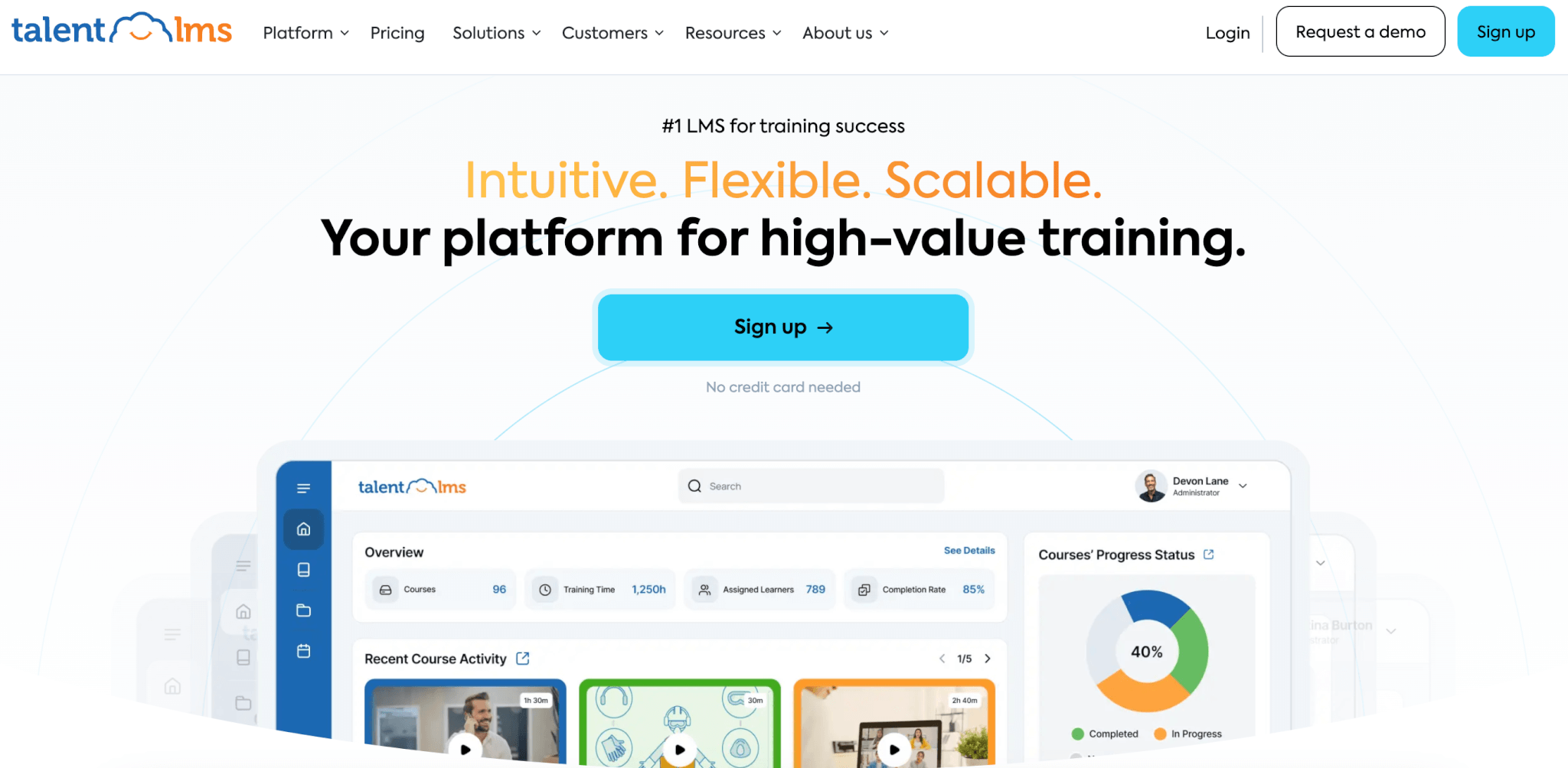 an image of TalentLMS landing page showing a smiling young woman with laptop
